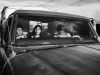 Migrants sit in a truck at the border town of Paraguachón, Colombia, waiting for a ride to the major city of Maicao.