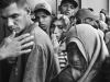 Migrants wait in line for a free meal at a church charity in Cucuta, Colombia.