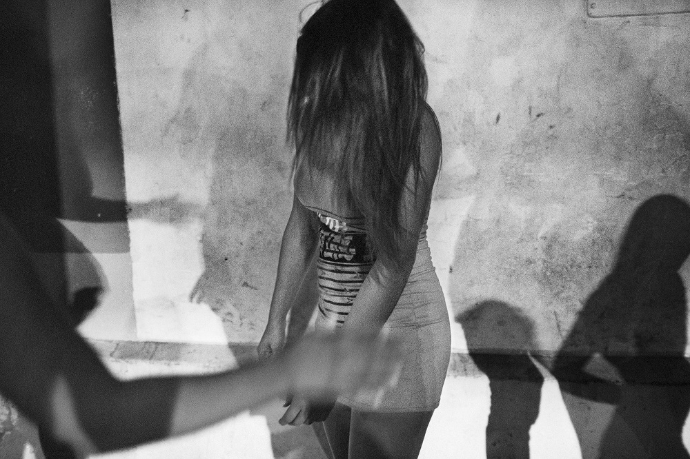 A Venezuelan girl stands in a street of the red light district in Cucuta, Colombia.